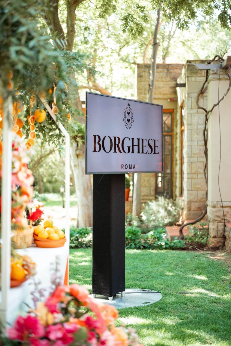 Borghese sign at a garden event, photographed by Indirect Media