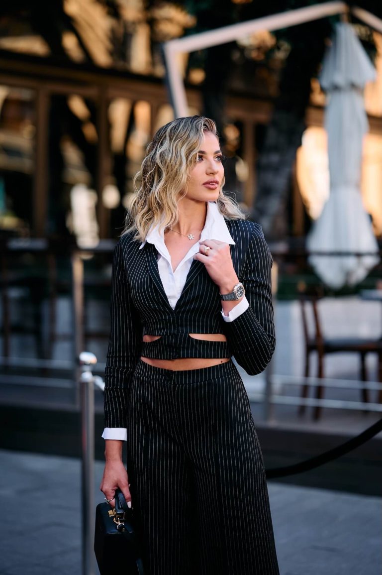 Guest in a pinstripe suit at the Bellagio and Bell & Ross red carpet, photographed by Indirect Media