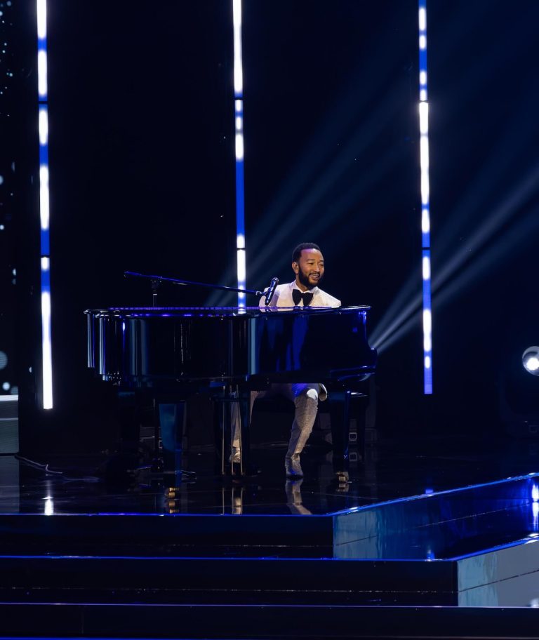 Performer at a grand piano on the Miss Universe 2023 stage, photographed by Indirect Media