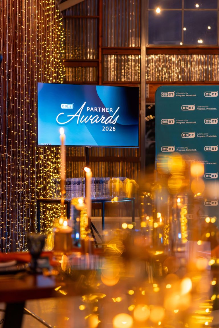 ESET Partner Awards 2026 screen and branded backdrop at a candlelit venue, photographed by Indirect Media